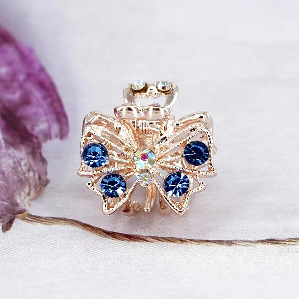 Venta al por mayor Pinza de pelo de aleación de nudo de lazo de diamante